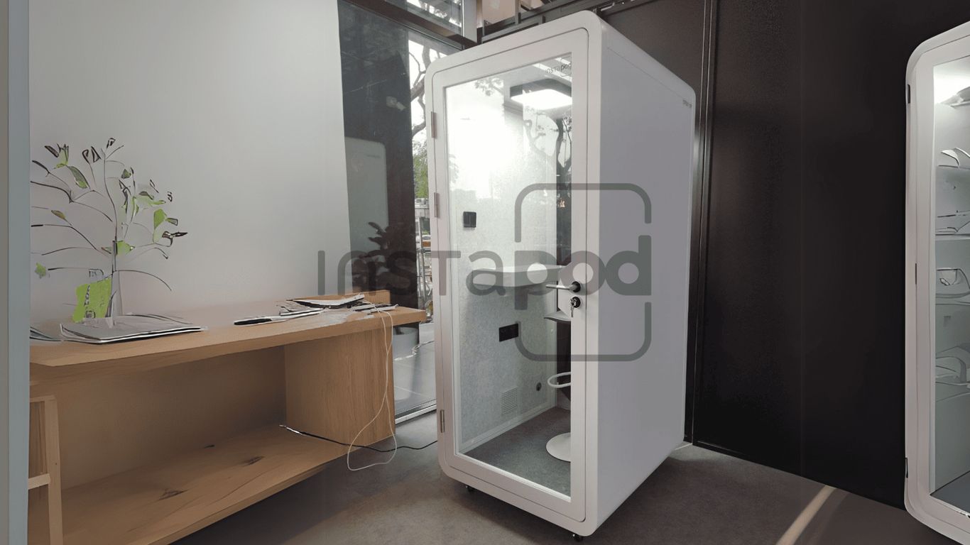 Modern self-contained pod in a minimalist indoor setting.