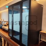 Modern office pod in a stylish interior space.